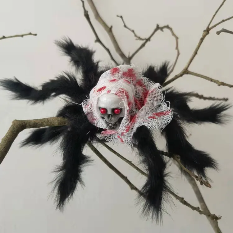 偽のクモの動物のフィギュアリアルな毛むくじゃらのクモ怖い巨大な頭蓋骨と顔をしかめるクモのいたずら小道具お化け屋敷KD2202