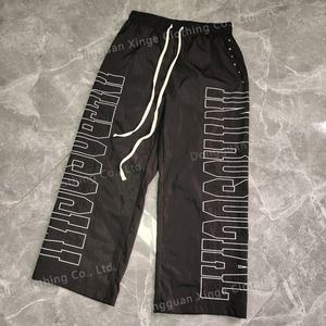 Pantalon en nylon à jambes larges brodé coupe-vent pour homme, jogging décontracté en polyester, pantalon de survêtement en nylon pour homme - Product Image 4