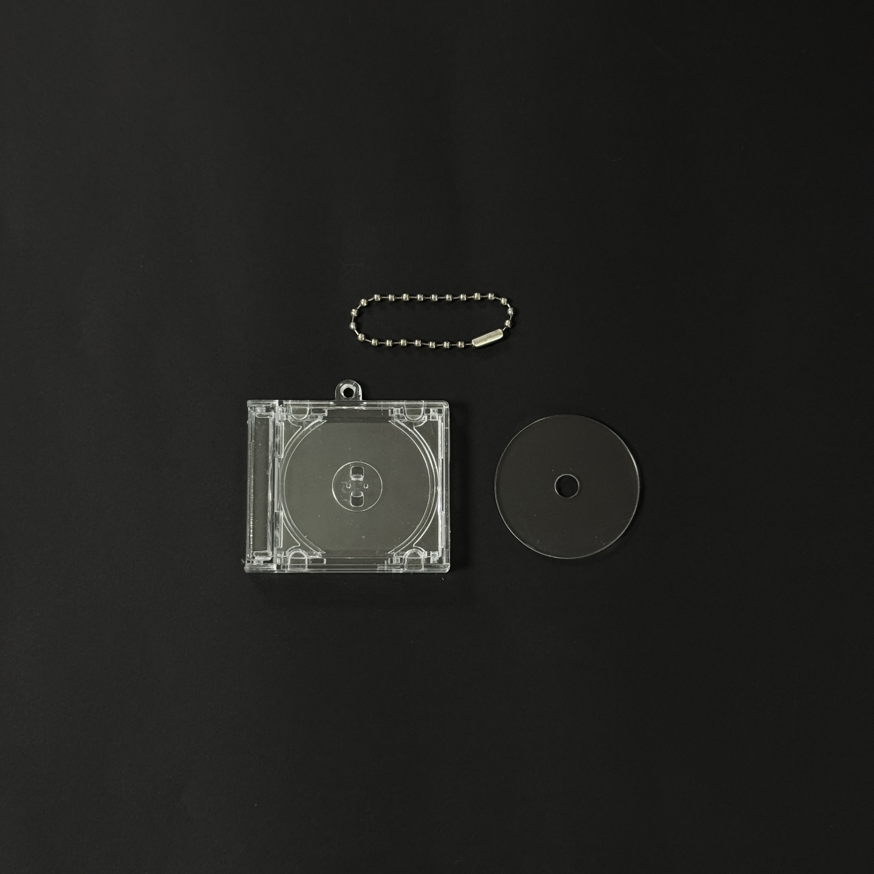 Custodia per CD + Catena con Perline + Disco