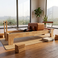 Reformer de Pilates portable et réglable en bois d'érable ou de chêne, durable, avec sangles de sécurité et poulies pour studio de Pilates