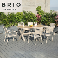 Ensemble de table et de chaises en bois plastique moderne pour l'extérieur, table extensible longue, imperméable, meubles de jardin en gros, directement de l'usine