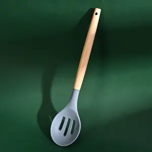 Juego de utensilios de cocina al por mayor 19, utensilios de silicona, tabla para cortar, juego de almacenamiento, mango de madera, cubo, cuchillo, juego de utensilios de cocina antiadherentes