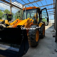 Chargeuse-pelleteuse sur pneus JCB 4CX d'occasion avec déplacement latéral, moteur 4.4L et boîte de vitesses, garantie 1 an