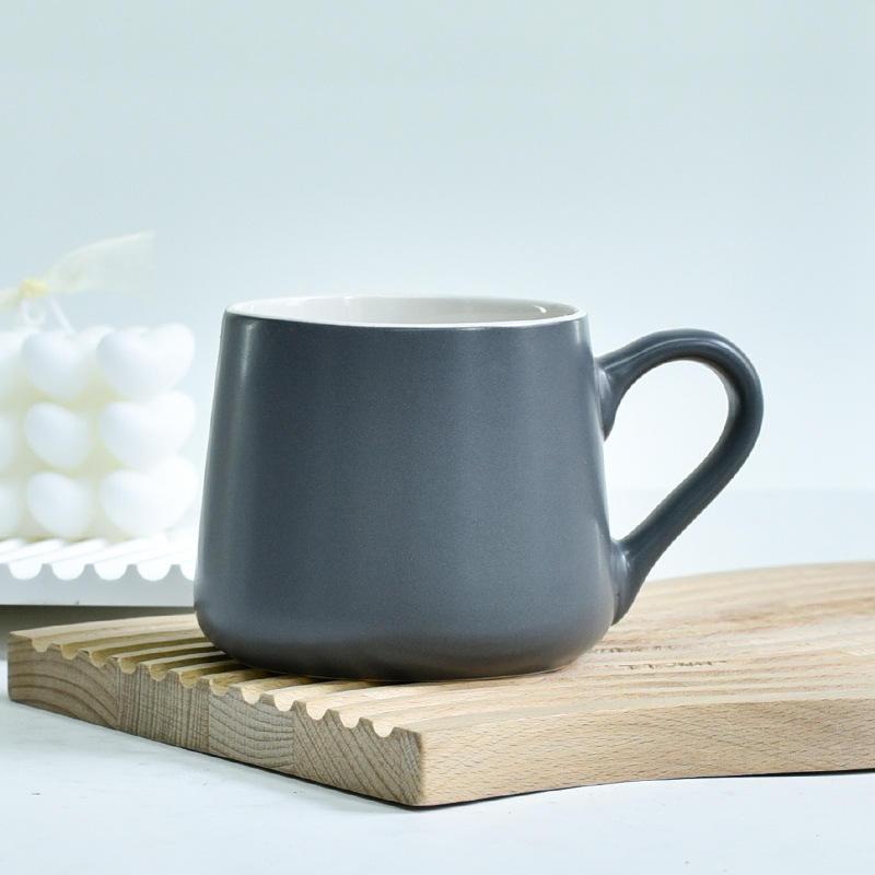 Matte dark gray wide-bellied cup