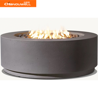 Table de feu ronde de couleur gris foncé au design minimaliste pour l'extérieur, foyer extérieur décoratif pour hôtel