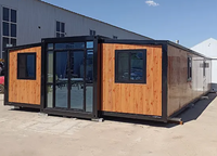 Maison conteneur modulaire préfabriquée de luxe extensible de 20 pieds avec design respirant pour villa, hôtel, salle de sport