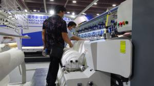 A quilting machine with multiple stitches for the edge fabric of a quilted mattress - Product Image 4