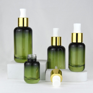 Flacon compte-gouttes à bouton-poussoir dégradé de luxe à baril rond fond épais 30ml huile essentielle 4 oz flacon compte-gouttes en verre vert 100ml - Product Image 4