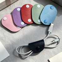 Organisateur de câbles en cuir PU avec logo personnalisé, bouton pression, attache en néoprène, support de câble pour cadeaux promotionnels