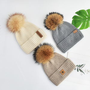 Bonnets personnalisés pour femmes avec <span class=keywords><strong>pompon</strong></span> en <span class=keywords><strong>fourrure</strong></span> véritable Chapeaux d'hiver tricotés en laine pour femmes <span class=keywords><strong>Bonnet</strong></span> de <span class=keywords><strong>ski</strong></span> à tête de mort avec logo personnalisé - Product Image 1