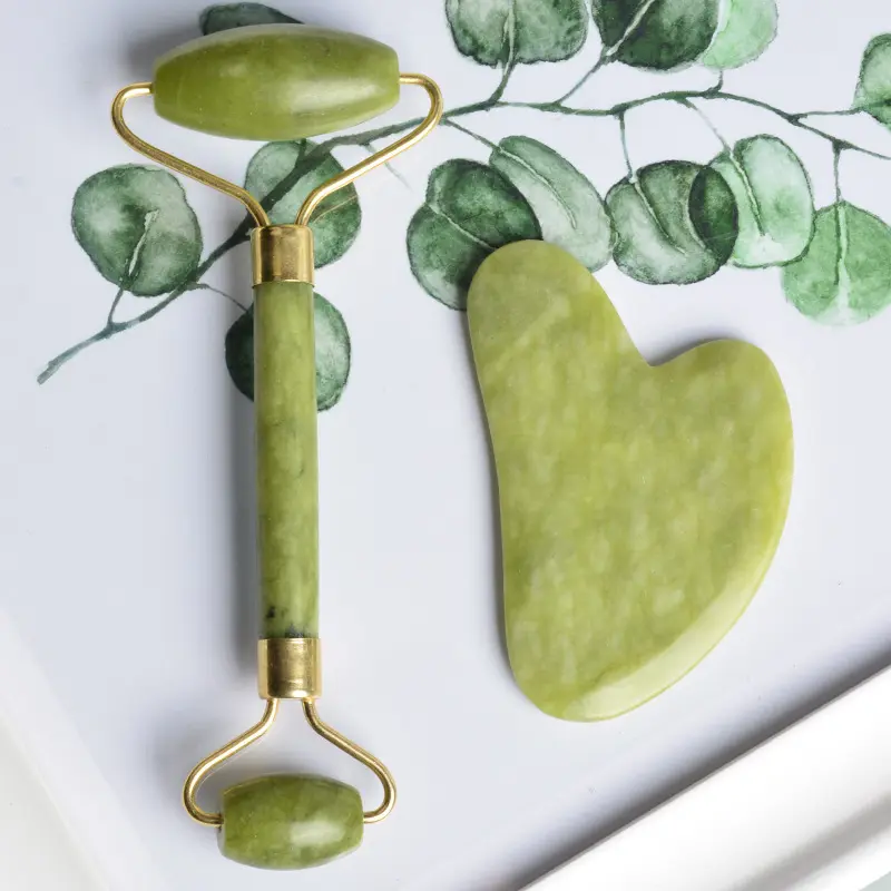 Rodillo de jade verde xiuyan natural 100% y herramientas gua sha facial guasha rodillo de piedra de jade rodillo de masaje de ojos Marco de hierro