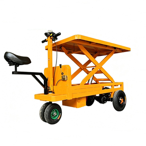 Chariot élévateur à ciseaux électrique jaune en acier à quatre roues réglable pour la manutention industrielle - Product Image 1