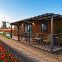 Maison conteneur de luxe extensible 40 pieds, structure en acier isolée avec terrasse et auvent pour complexe balnéaire en bord de lac