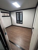 Maison préfabriquée de luxe extensible de 40 pieds, villa modulaire à double aile pliable avec cuisine et chambre