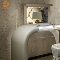 Bureau de toilette moderne de luxe entièrement rembourré avec design en cascade incurvée et miroir intégré, table de maquillage élégante