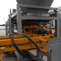 Machine à fabriquer des blocs de pavés hydrauliques QT4-15 pour produits en béton