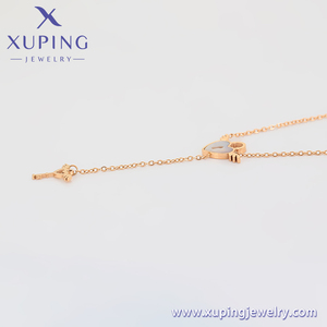 T000685728 Xuping bijoux mode simple élégant or rose cristal d'amour plus cupidon clé gland collier en acier inoxydable - Product Image 3