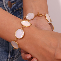 Bracelet de créateur étanche pour la plage, style bohème, en coquillages naturels, fait main, forme ronde, en acier inoxydable plaqué or 18 carats