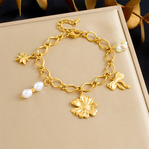 Fashion Charm Bracelet Gold Plated Flower Pearl Bow Chain Women's Jewelry Gift Accessory - Product Image 1