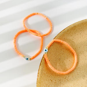 Bracelet ajustable en perles d'argile bohèmes faites à la main avec breloque œil de diable en coquillage pour homme, marque Quake - Product Image 4