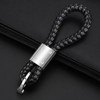 Porte-clés de voiture en cuir tressé à la main, pendentif souvenir à suspendre à la ceinture