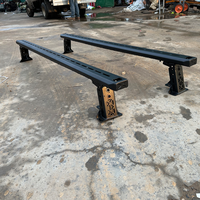 Barre transversale réglable en hauteur pour benne de pick-up avec barres de chargement à fentes et fixation sur rail TC49