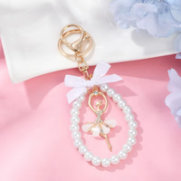 Porte-clés Perle Danseuse de Ballet, Pendentif Fille avec Jupe et Nœud Colorés, Breloque Mignonne pour Sac, Cadeau de Danse pour Ballerine, Souvenir
