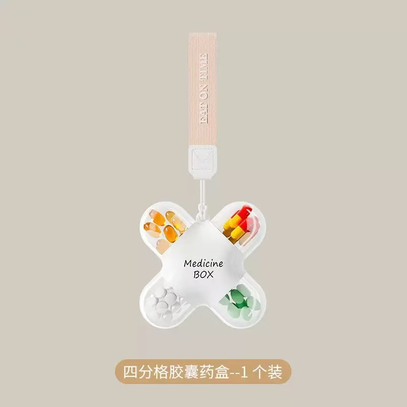 Boîte à médicaments à quatre compartiments