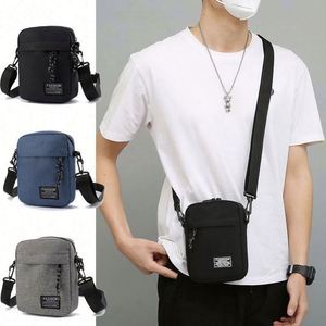 Elegante Bolso Bandolera Mini de Tela Oxford con Cierre de Cremallera, Impermeable, Unisex, para Uso Diario - Product Image 1