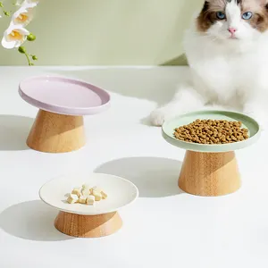 2024 Wholesale Split Ceramic Wood Pet Bowl Elevated Inclined Anti-slip Bowl Cat Dog Food Ceramic Bowl With Wooden Stand