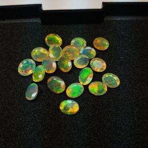 Ópalo Blanco Etíope de Alta Calidad Welo Fire Natural 8x10mm Ovalado Calibrado Gema Suelta Facetada Corte Suelto Venta al por Mayor - Product Image 1