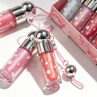 Kit de maquillage pour les lèvres en gros : Ensemble de gloss liquide rose tendance avec pendentif et capuchon argenté mignon, et cordon de suspension