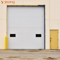 Solution Complète pour Portes Industrielles Modernes en Acier Inoxydable, Étanches et Segmentées, Coulissantes et Élevées, pour Projets Industriels de Jieyang Jiangsu