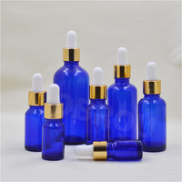 Mattierte Blaue Glasfläschchen mit Siebdruck-Etiketten & Goldprägung für Kosmetik-Körperöl-Verpackungen