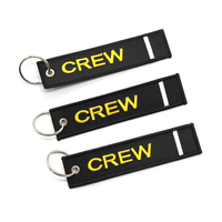 Vente en gros d'usine Porte-clés RANDOMED CREWMEMBER, étiquette en tissu personnalisée avec logo, broderie, porte-clés tressé, étiquette de bagage