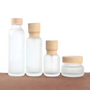 Toptan kozmetik cam şişe keçi sütü serisi 50ml 110ml pompa şişesi 150ml vidalı kapak ve 50 gr krem kavanoz seti