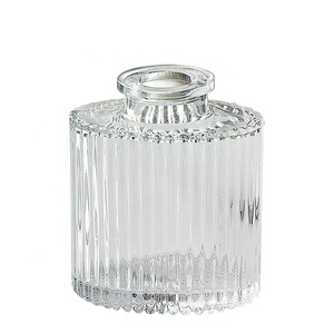 <span class=keywords><strong>Vase</strong></span> <span class=keywords><strong>en</strong></span> <span class=keywords><strong>verre</strong></span> à relief à <span class=keywords><strong>grand</strong></span> diamètre créatif pour la décoration de mariage avec un petit <span class=keywords><strong>vase</strong></span> <span class=keywords><strong>en</strong></span> <span class=keywords><strong>verre</strong></span> <span class=keywords><strong>cylindrique</strong></span> blanc - Product Image 1