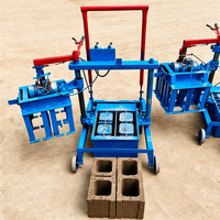 Petite machine électrique de fabrication de briques de ciment emboîtables