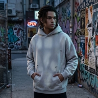 Sweat à capuche oversize pour homme, effet délavé vintage, avec doublure polaire, détails déchirés et usés, motif graffiti singe audacieux, style streetwear
