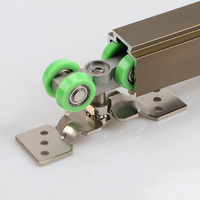 Rouleaux d'amortisseur de porte coulissante à fermeture douce simple de conception moderne système de quincaillerie de glissière de porte de poche Cont