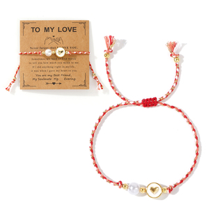 Pulsera de cuerda trenzada roja y blanca hecha a mano Resoul con amuleto de mariquita y flor margarita, joyería de protección y buena suerte para mujer - Product Image 4