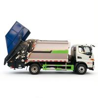Camion compacteur à bras oscillant JAC 4x2 8CBM, véhicule de collecte des déchets hydraulique pour l'assainissement municipal, directement de l'usine