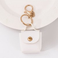 Porte-monnaie en gros, mini sac de rangement, sac carré en cuir PU de couleur unie, accessoires porte-clés, pendentif de voiture, pendentif moderne