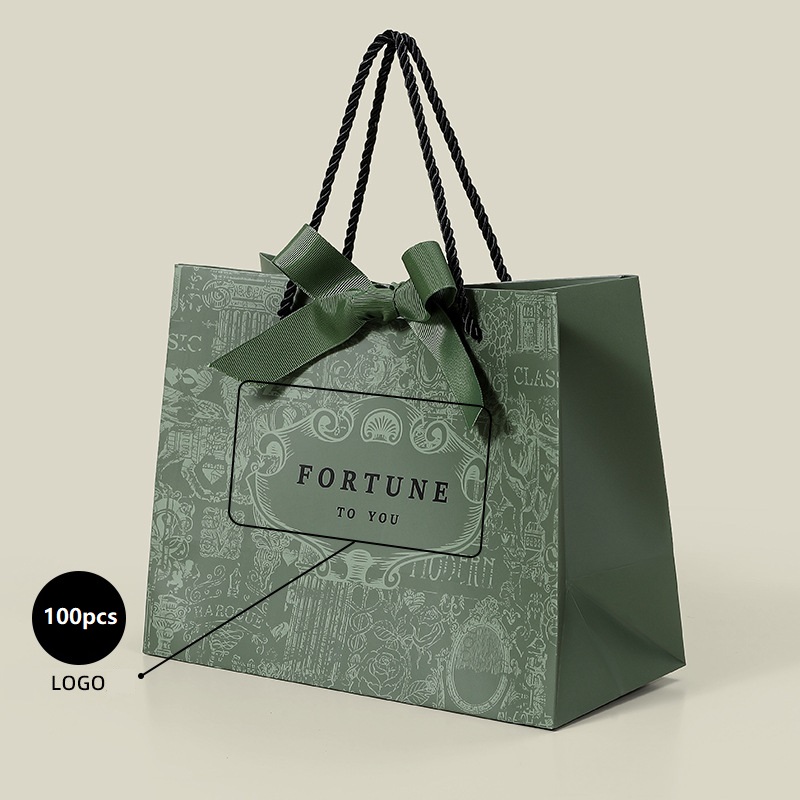 2026 Hot Sell Environment Friendly Paper Bag Green Gift Packaging Paper Bag Custom Logo