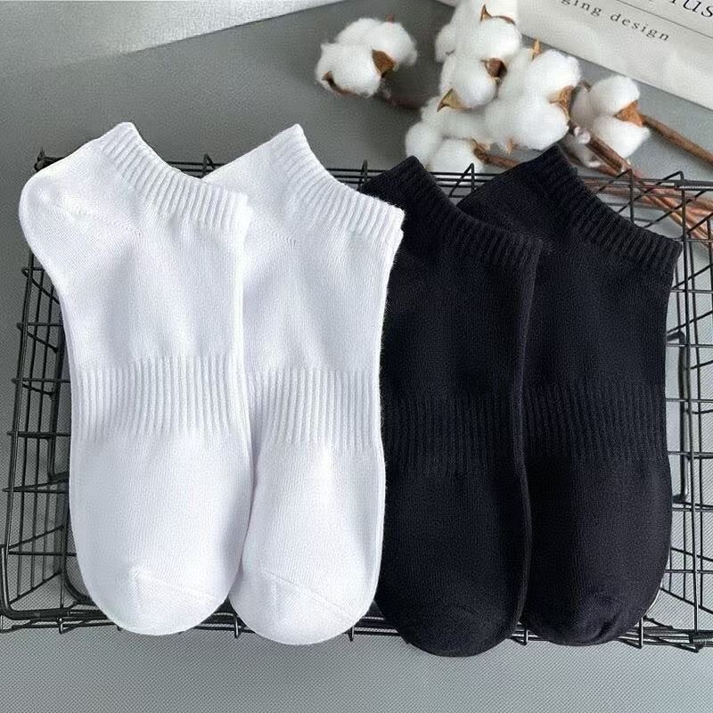 Black and white corsets and black boat stockings
