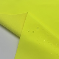 Autorización de marca 2025 nuevo estilo 100% tela de poliéster 300gsm tejido naranja combinado Softshell tela para chaqueta al aire libre