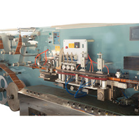 Machine de fabrication de tubes souples pour dentifrice ABL