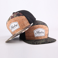 Casquette de golf structurée à 7 panneaux et visière plate, personnalisée, haut de gamme, en tissu sport respirant perforé découpé au laser, imprimé camouflage, pour la vente en gros