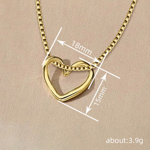 Collana girocollo con ciondolo a cuore traforato per donna, gioielli minimalisti alla moda per l'uso quotidiano - Product Image 4
