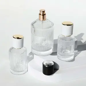 ふたと噴霧器付きのエレガントなガラス製香水瓶 (30ml、50ml、100ml) -世界中に出荷する準備ができています